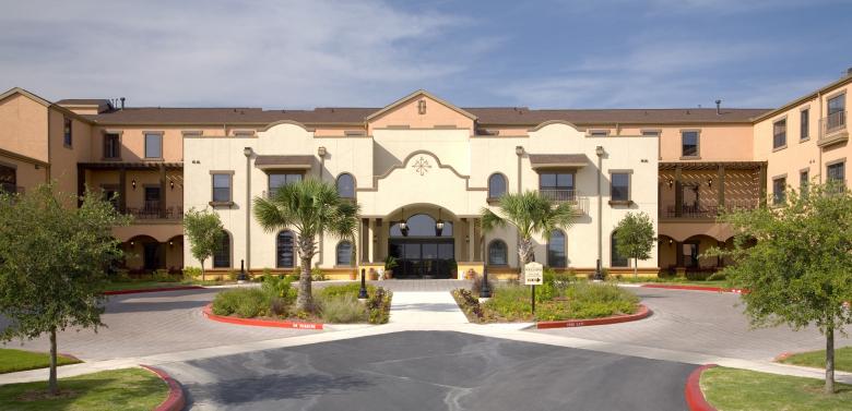 An architectural photo of the exterior of a senior living facility.